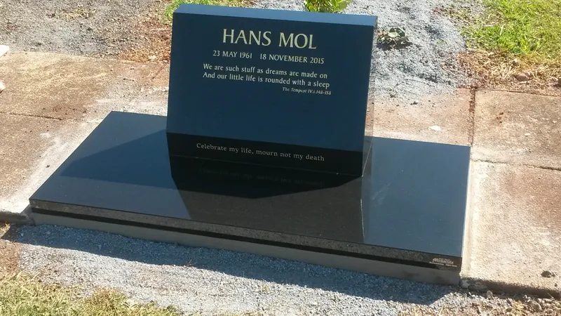 Black granite headstone with a full polished black granite ledger