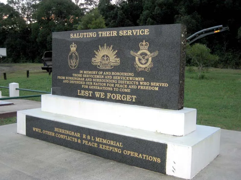 Saluting Their Service RSL memorial in black granite on a white plinth