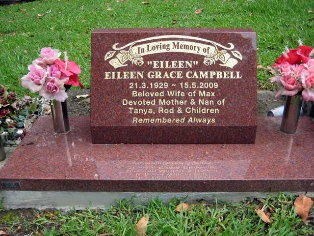 Imperial red granite memorial on a double base